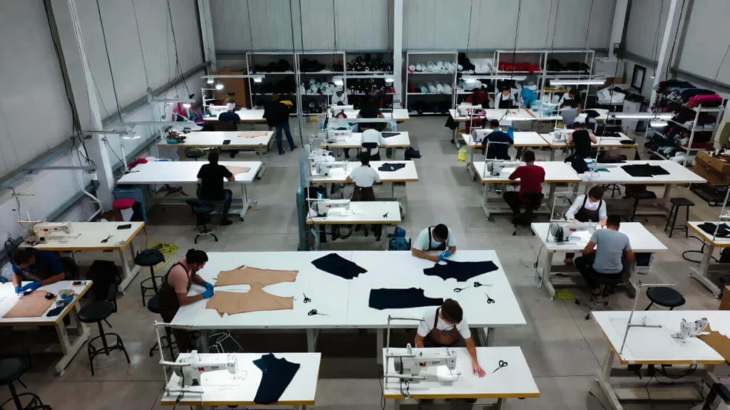 Cut and sew streetwear manufacturing showing pattern making, fabric cutting, and garment assembly