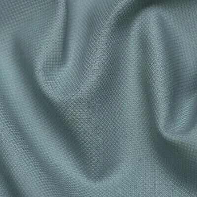 Dobby fabric with small geometric woven patterns for apparel manufacturing by Hesson Apparel