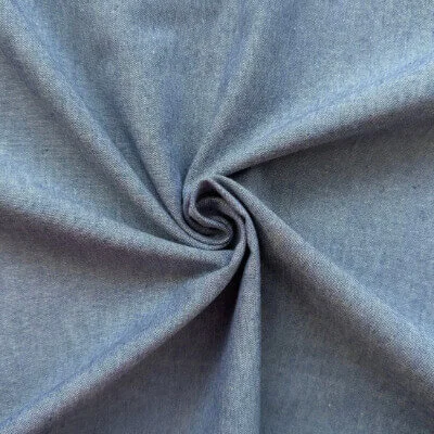 Chambray fabric with lightweight woven texture for apparel manufacturing by Hesson Apparel