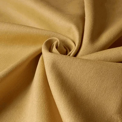 Twill fabric with diagonal weave for durable apparel manufacturing by Hesson Apparel