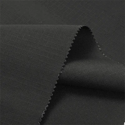 Ripstop fabric with reinforced weave for durable apparel manufacturing by Hesson Apparel
