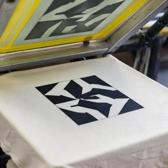 Screen printing process for long-lasting and vibrant apparel graphics by Hesson Apparel