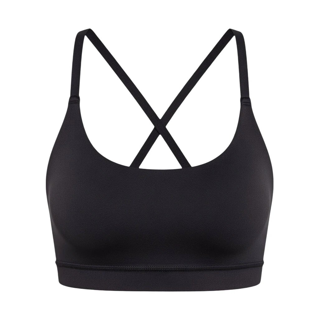 Custom light-impact sports bra manufactured with soft stretch fabric for activewear brands.